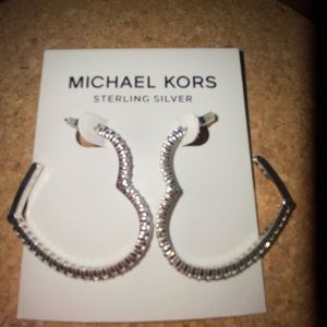 Michael Kors heart hoop earrings.